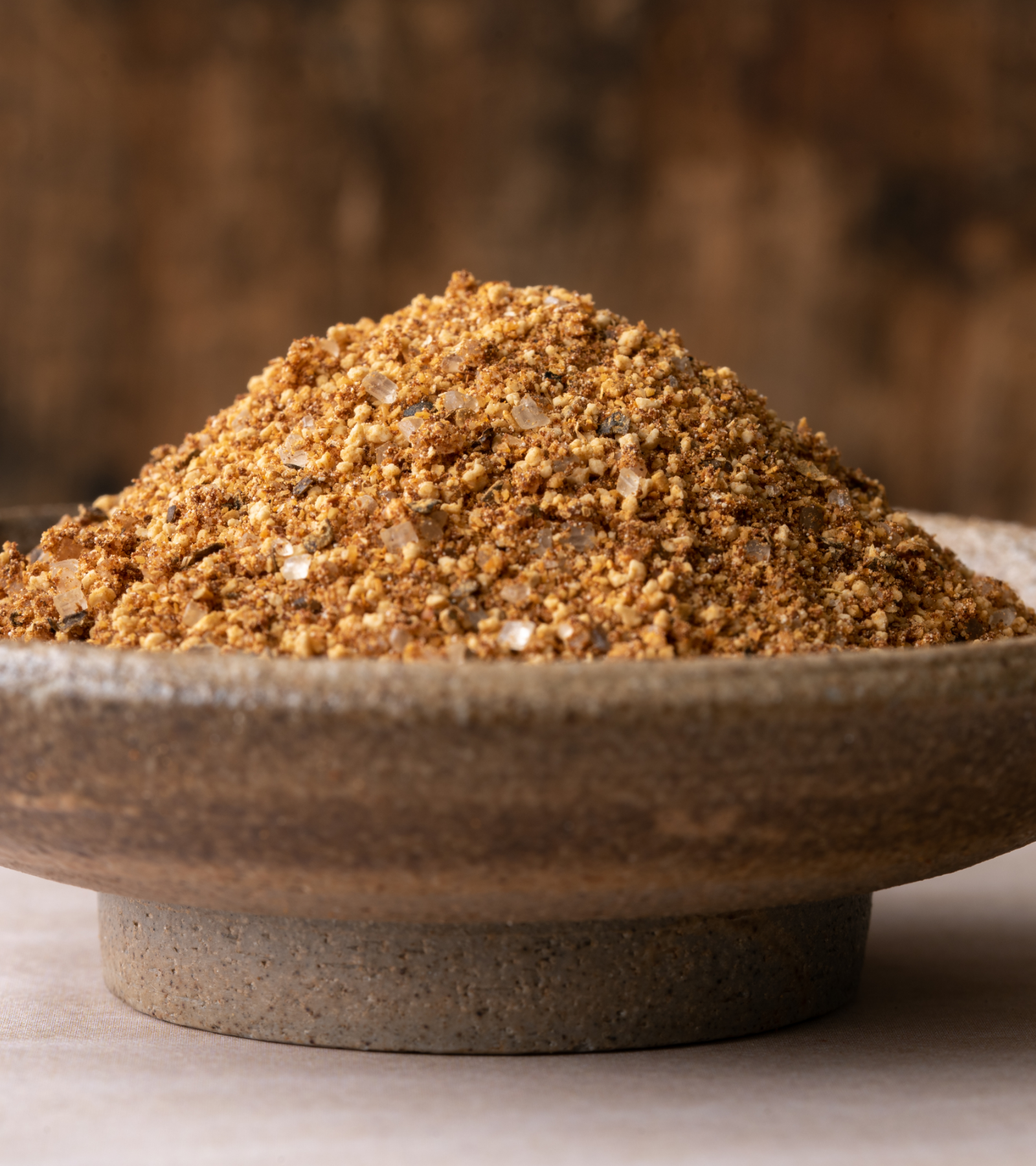 A stone bowl filled with powdered mesquite